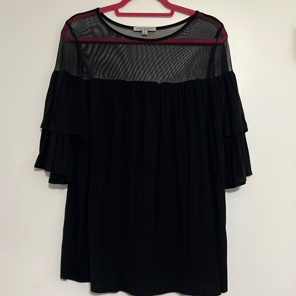 Black top with sheer neck and ruffle sleeves